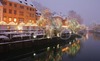 Old central part of Slovene capital city Ljubljana, Slovenia, is decorated with Christmas lights. Heavy snowfall which lasts for 2 days already, added some more winter atmosphere.
