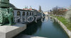 Dragon Bridge leading road over Ljubljanica river in middle of Slovene capital city Ljubjana, Slovenia.
