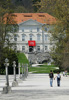 People are enjoying sunny and warm spring day in Tivoli park in Ljubljana, Slovenia. The Tivoli is Ljubljanas largest and most beautiful park, which extends to the very city centre. It was designed in 1813 by the French engineer J. Blanchard, who joined the two parks which used to surround the Podturn and Cekin Mansions. Measuring about 5 square kilometres, the park is divided by three major horse chestnut-lined walks. Apart from the scattered flower beds and interesting trees, the park decoration includes a large number of statues and several fountains. In 1880, a fish pond was built at the edge of the park.
