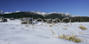 Old houses on Javorniska Planina on Pokljuka plateau, Slovenia, are covered with first snow. Land, which is normally covered with snow on end of November, is this year, hardly covered with snow only few days before Christmas. <br> Pokljuka is a foresty plateau at the altitude of around 1300 metres, situated partly in the municipality of Bled, Slovenia and partly in municipality of Bohinj, Slovenia in northwestern Slovenia. It is part of Triglav national park. The plateau is known for its winter sports facilities, among which is also yearly Biathlon World Cup, which is held at Biathlon center Pokljuka, Slovenia.
