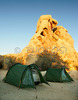 Campsite in Hidden valley under magnificent rock formations and Joshua trees in Joshua tree National Park, CA, USA. Joshua Tree NP is situated in junction of Mohave and Colorado desert in south east California, USA.
