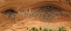 Ruins of House under the Rock below in Canyon de Chelly. Canyon de Chelly National Monument is located near Chinle, AZ, USA and is hiding numerous house ruins of Navajo Indians, which were settled in Canyon de Chelly. Labyrinth called Canyon de Chelly is really several canyons, which include Canyon de Chelly and Canyon del Muerto. At the mouth of the canyon the rock walls are only 30 feet high. Deeper into the canyons, to the east, the walls rise dramatically until they reach more than 1000 feet above the floor. The cliffs rise straight up, overshadowing the streams, cottonwoods, and small farms below. It has taken about two million years and volumes of water to etch these stone paths through the layers of sandstone and igneous rock as the Defiance Plateau pushed its way upward. Today the canyon still beckons us with its towering stone monoliths and ledges bearing the open windows of ancient people.

