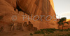 White house ruin below in Canyon de Chelly. White house was built  by ancient Puebloan people and occupied around 1000 years ago.  It is named for the long wall in the upper dwelling that is covered with white plaster. Canyon de Chelly National Monument is located near Chinle, AZ, USA and is hiding numerous house ruins of Navajo Indians, which were settled in Canyon de Chelly. Labyrinth called Canyon de Chelly is really several canyons, which include Canyon de Chelly and Canyon del Muerto. At the mouth of the canyon the rock walls are only 30 feet high. Deeper into the canyons, to the east, the walls rise dramatically until they reach more than 1000 feet above the floor. The cliffs rise straight up, overshadowing the streams, cottonwoods, and small farms below. It has taken about two million years and volumes of water to etch these stone paths through the layers of sandstone and igneous rock as the Defiance Plateau pushed its way upward. Today the canyon still beckons us with its towering stone monoliths and ledges bearing the open windows of ancient people.
