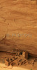 Ruins of Antelope house bellow in Canyon de Chelly. Canyon de Chelly National Monument is located near Chinle, AZ, USA and is hiding numerous house ruins of Navajo Indians, which were settled in Canyon de Chelly. Labyrinth called Canyon de Chelly is really several canyons, which include Canyon de Chelly and Canyon del Muerto. At the mouth of the canyon the rock walls are only 30 feet high. Deeper into the canyons, to the east, the walls rise dramatically until they reach more than 1000 feet above the floor. The cliffs rise straight up, overshadowing the streams, cottonwoods, and small farms below. It has taken about two million years and volumes of water to etch these stone paths through the layers of sandstone and igneous rock as the Defiance Plateau pushed its way upward. Today the canyon still beckons us with its towering stone monoliths and ledges bearing the open windows of ancient people.
