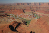 Morning view over Canyonlands from Dead Horse point in Dead Horse Point State park, Utah, USA. Canyonlands preserves a wilderness of rock at the heart of the Colorado Plateau. Water and gravity have been the prime architects of this land, cutting flat layers of sedimentary rock into hundreds of canyons, mesas, buttes, fins, arches, and spires. At center stage are two canyons carved by the Green and Colorado rivers. Surrounding the rivers are vast and very different regions, Island in the Sky on north, the Maze at west and the Needles at east. Canyonlands national park is located near Moab, Utah, USA.
