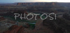 Sunset over Canyonlands, Utah, USA, from Dead Horse Point in Dead Horse Point State park, Utah, USA. Canyonlands preserves a wilderness of rock at the heart of the Colorado Plateau. Water and gravity have been the prime architects of this land, cutting flat layers of sedimentary rock into hundreds of canyons, mesas, buttes, fins, arches, and spires. At center stage are two canyons carved by the Green and Colorado rivers. Surrounding the rivers are vast and very different regions, Island in the Sky on north, the Maze at west and the Needles at east. Canyonlands national park is located near Moab, Utah, USA.

