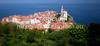 View to city of Piran, Slovenia, from walls above city. The city resembles a large open-air museum, with medieval architecture and a rich cultural heritage. Narrow streets and compact houses give the town its special charm.
