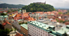 View to Tromostovje (Three bridges) and Ljubljana castle from top of Neboticnik. Neboticnik (Slovene for Skyscraper) is a prominent high-rise located in the centre of Ljubljana, Slovenia, and is one of the citys most recognizable landmarks. Its thirteen stories rise to a height of 70.35m. Neboticnik was designed by the Vladimir Subic for the Pension Institute, the buildings investor. Construction began in July 1930 and the building opened on 21 February 1933. It was, upon completion, the tallest building in the Kingdom of Yugoslavia, and the ninth-tallest high-rise in Europe.
