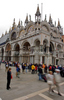 People are storming Piazza San Marco while others are already queing to enter Basilica of Saint Mark (officially known in Italian as the Basilica Cattedrale Patriarcale di San Marco and commonly known as Saint Mark Basilica) during early morning hours. Piazza San Marco (often known in English as St Mark Square), is the principal public square of Venice, Italy, where it is generally known just as the Piazza. All other urban spaces in the city (except the Piazzetta and the Piazzale Roma) are called campi (fields). The Piazzetta (the little Piazza) is an extension of the Piazza towards the lagoon in its south east corner (See plan). The two spaces together form the social, religious and political centre of Venice and are commonly considered together.

