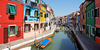 Burano is an island in the Venetian Lagoon, Italy. Like Venice itself, it could more correctly be called an archipelago of four islands linked by bridges. It is situated near Torcello at the northern end of the Lagoon, and is known for its lacework and brightly colored homes. <br> Small, brightly-painted houses on Burano follow a specific system originating from the golden age of its development. If someone wishes to paint their home, one must send a request to the government, who will respond by making notice of the certain colors permitted for that lot.
