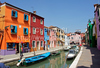 Burano is an island in the Venetian Lagoon, Italy. Like Venice itself, it could more correctly be called an archipelago of four islands linked by bridges. It is situated near Torcello at the northern end of the Lagoon, and is known for its lacework and brightly colored homes. <br> Small, brightly-painted houses on Burano follow a specific system originating from the golden age of its development. If someone wishes to paint their home, one must send a request to the government, who will respond by making notice of the certain colors permitted for that lot.
