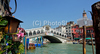 The Rialto Bridge (Ponte di Rialto) is one of the four bridges spanning the Grand Canal in Venice, Italy. It is the oldest bridge across the canal, and was the dividing line for the districts of San Marco and San Polo. 

