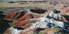 Painted desert bandlands are located on North part of Petrified forest National Park. Petrified Forest National park preserves the largest concentration of petrified wood in North America, perhaps in the World. What sets it apart from other petrified wood sites is its scenic surroundings of badlands, which provide an otherworldly feeling to the experience. Petrified Forest National park is situated approximately 20 miles east of Holbrook, AZ, USA