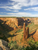 Spider rock is an 800 foot sandstone spire that rises from the canyon floor at the junction of Canyon de Chelly and Monument Canyon. Labyrinth called Canyon de Chelly is really several canyons, which include Canyon de Chelly and Canyon del Muerto. At the mouth of the canyon the rock walls are only 30 feet high. Deeper into the canyons, to the east, the walls rise dramatically until they reach more than 1000 feet above the floor. The cliffs rise straight up, overshadowing the streams, cottonwoods, and small farms below. It has taken about two million years and volumes of water to etch these stone paths through the layers of sandstone and igneous rock as the Defiance Plateau pushed its way upward. Today the canyon still beckons us with its towering stone monoliths and ledges bearing the open windows of ancient people.