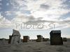 Beach chairs are abandoned in windy summer evening on sandy beaches of North Germanys tourist resort Warnemunde. Temperatures around +18 degres of Celsius and strong wind made bathers to leave early, and wind had its own way to play with sand and beach equipment on endless Baltic sandy beaches.
