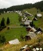 Zajamniki mountain pasture is located 1234m above sea level, just few kilometers north of Bohinj Lake, Slovenia. Approximately 80 cottages, before used as herdsman houses, are nowadays mainly used as summer cottages, and are spread almost in straight line through Zajamniki pasture. View Julian alps in background, they create one of most magnificent views in mountains of north west Slovenia.
