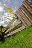 Wooden fence in middle of blooming spring field near village Podljubelj, Slovenia.
