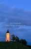Church of Saints Primus and Felician in Jamnik, Slovenia on late evening of 26th of May 2010, when sun was setting down behind plateu of Jelovica. Church is build on hill overlooking most of the northern part of the Ljubljana Basin with the Julian Alps as a backdrop towards the northwest and the Kamnik Alps towards the east.
