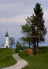 Church of Saints Primus and Felician in Jamnik, Slovenia on late evening of 26th of May 2010, when sun was setting down behind plateu of Jelovica. Church is build on hill overlooking most of the northern part of the Ljubljana Basin with the Julian Alps as a backdrop towards the northwest and the Kamnik Alps towards the east.
