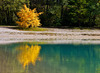 The lake Jasna is situated in an idyllic alpine valley just before the first turns of the road to the mountain passage Vrsic, which is the highest road passage in the Eastern Julian Alps. Jasna lake consists of two connected reservoirs that were made by taking away the gravel from the confluence of the creeks Velika and Mala Pisnica.
