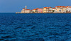 View to city of Piran, Slovenia, from coast between Piran and Portoroz. The city resembles a large open-air museum, with medieval architecture and a rich cultural heritage. Narrow streets and compact houses give the town its special charm.
