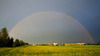 Rainbow on sky above fields near Kranj, Slovenia, on summer evening of 13th June 2014, after rain storm just passed the area.

