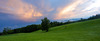 Fields near Preddvor, Slovenia, on summer evening of 13th June 2014,  with stormy sky above them, just after rain storm just passed the area.
