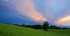 Fields near Preddvor, Slovenia, on summer evening of 13th June 2014,  with stormy sky above them, just after rain storm just passed the area.
