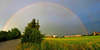 Rainbow reaching over The France Preseren Gymnasium in  Kranj. 
