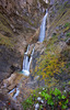 Martuljek stream follows its path through a 500 meters long ravine dropping over the 50 meters high rock face as the Lower Martuljek waterfall onto a 400 meters long but narrow Martuljek canyon carved into lime rock. 
