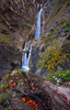 Martuljek stream follows its path through a 500 meters long ravine dropping over the 50 meters high rock face as the Lower Martuljek waterfall onto a 400 meters long but narrow Martuljek canyon carved into lime rock. 
