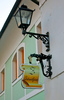 Streetlamp and a signpost in Tomsiceva street in Kranj
