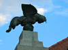 Plecnik Fountain  <br>  <br> The architect Joze Plecnik had planned to make a monumental entrance into the town. He transformed the steep slope into a staircase and replaced the former well (called sterna) with an obelisk topped by a bronze rooster from which the water runs into stone, terraced vessels. The fountain is an interpretation of the Garden of Eden at Hradcany, Prague. <br> 
