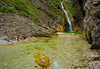 Zapotok waterfall is located on the end of Upper Trenta valley, Slovenia, and was created by Suhi Potok stream. Its surrounded by Prisank, Razor and Bavski Grintavec mountains.
