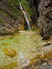 Zapotok waterfall is located on the end of Upper Trenta valley, Slovenia, and was created by Suhi Potok stream. Its surrounded by Prisank, Razor and Bavski Grintavec mountains.
