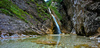 Zapotok waterfall is located on the end of Upper Trenta valley, Slovenia, and was created by Suhi Potok stream. Its surrounded by Prisank, Razor and Bavski Grintavec mountains.
