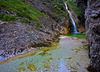 Zapotok waterfall is located on the end of Upper Trenta valley, Slovenia, and was created by Suhi Potok stream. Its surrounded by Prisank, Razor and Bavski Grintavec mountains.
