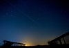 Night sky with stars and perseid meteor shower on field near village Bitnje, Slovenia, on clear summer night of 12th of August 2015.
