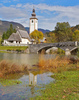 Church of  Sv. Janeza Krstnika (St. John The Baptist) in Bohinj, Slovenia, surrounded by trees already painted in autumn colors on Saturday, 17th of October 2015.
