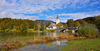 Church of  Sv. Janeza Krstnika (St. John The Baptist) in Bohinj, Slovenia, surrounded by trees already painted in autumn colors on Saturday, 17th of October 2015.
