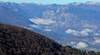 View to Bohinj and Bohinj lake from top of mountain Mozic. Mozic is mountain above Soriska Planina near Sorica, Slovenia, on late autumn day of 31st of October 2015.
