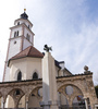 Rosary church, Rozenvenska cerkev, Cankarjeva ulica, Kranj <br>   <br> In the first decade of the 16th century, this succursal church dedicated to the Holy Mother of the Rosary was built above the lower city gate. In the 1570s, the church served as a place of worship for Protestants and during this period all its original furnishings were lost. The church was restored in the 17th century. The church is an ordinary example of Late Gothic architecture with a rectangular nave and somewhat narrower presbytery. The presbytery and nave have Gothic vaulting. In 1892, the church was completely renovated in the historicist style, and thus a great many of the historical features were removed. However, the church is still an important element of the view of the city and a dominant feature of the old city. <br>  <br> Plecnik Fountain  <br>  <br> The architect Joze Plecnik had planned to make a monumental entrance into the town. He transformed the steep slope into a staircase and replaced the former well (called sterna) with an obelisk topped by a bronze rooster from which the water runs into stone, terraced vessels. The fountain is an interpretation of the Garden of Eden at Hradcany, Prague. <br> 

