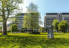 Kranj, Park La Ciotat view towards Bleiweisova street and Gorenjska bank building on left and police station building on right.
