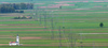 View to church in middle of fields near village of Bitnje, Slovenia, from top of Smarjenta gora, 652m high hill near Kranj, Slovenia on Sunday morning, 24th of April 2016.
