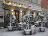 Outdoor cafe tables and chairs under a carpet of snow in Kranj  on 27th of April 2016.
