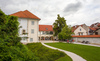 Khislstein Castle with the Khislstein 12.56 cafe. The newest part of the building is the courtyard tract with arcade passageways, made during reconstructions in the 18th and 19th centuries.  Kranj, Slovenia
