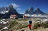 Hikers on their way on trails around Drei Zinnen - Tre Cime above Misurina, Italy, during early morning hike on Tuesday, 25th of June 2019.
