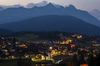 View to Seefeld village, church and village lights in late evening from nearby mountain.
