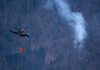 Few 100 firefighters, 4 helicopters and firefighting plane that came to help from Croatia, tried to extinguish forest fire that started in mountains above village Potoce near Preddvor, Slovenia on Monday 28th of March 2022. Their efforts were still continuing on Tuesday, 29th of March 2022.