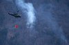 Few 100 firefighters, 4 helicopters and firefighting plane that came to help from Croatia, tried to extinguish forest fire that started in mountains above village Potoce near Preddvor, Slovenia on Monday 28th of March 2022. Their efforts were still continuing on Tuesday, 29th of March 2022.